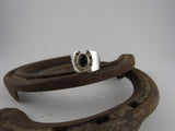 Wide Band Horseshoe with Stone and Diamonds Ring