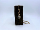 Bespoke Infinity Nail Pendant with Aquamarine