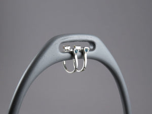 Horseshoe Nail Hoop Earrings in Sterling Silver with Blue Topaz  by Chele Clarkin