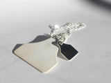Large Cow Ear Tag Pendant from Chele Clarkin Jewellery